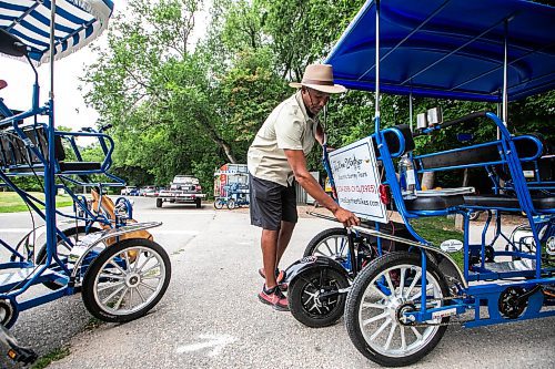 MIKAELA MACKENZIE / FREE PRESS
Chad Celaire, owner of Bee2gether Bikes, puts the electric wheel down on one of the new rigs at Assiniboine Park on Monday, July 14, 2025. Bee2gether Bikes is unrolling Bee2gether Electric Surrey Tours, which are new guided tours of the park.
For Gabby story.
Winnipeg Free Press 2025