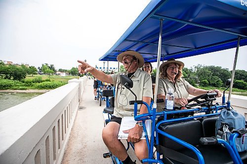 MIKAELA MACKENZIE / FREE PRESS
Jan Pedersen (left) and Kris Stefansson, the first tour guides at Bee2gether Bikes, tour Assiniboine Park on Monday, July 14, 2025. Bee2gether Bikes is unrolling Bee2gether Electric Surrey Tours, which are new guided tours of the park.
For Gabby story.
Winnipeg Free Press 2025