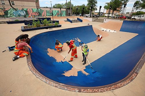 16072025
City of Brandon Parks and Recreation workers paint the bowl at the Kristopher Campbell Memorial Skate Plaza in downtown Brandon on Wednesday. The workers have been painting all the ledges, banks and transitions in preparation for the Skatepark Graffiti Jam event scheduled for the plaza on August 2nd. The event, presented by the City of Brandon and Brandon Downtown Biz will feature music, food, skateboarding and graffiti artists creating murals within the skatepark.
(Tim Smith/The Brandon Sun)