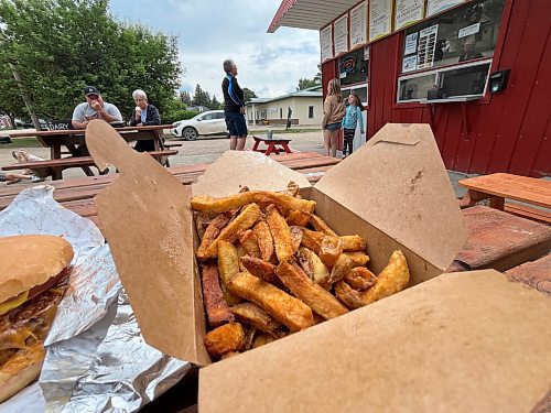 Home cut fries at The Dairy Bar in Souris are served soft and seasoned in a takeaway box. (Matt Goerzen/The Brandon Sun)