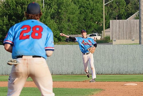 Brandon Cardinals shortstop Paycen Warkentin (8) throws to first baseman Xander Eilers (28) to put out a Boissevain Centennials hitter during Game 2 of their best-of-five South West Baseball League semifinal at Andrews Field on Thursday evening. (Perry Bergson/The Brandon Sun)
July 17, 2025
