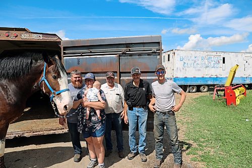Eric Thevenot, Charity Thevenot (nee Martin), Hallie Thevenot, Blaine Martin, Calvin Martin and Keegan Gamey are seen at Boulder Bluff Clydesdales farm near Strathclair. The Martin family spans multiple generations of farming clydesdales in Manitoba. They are seen before heading off to Austin for a show, where they will put their horses on the stage. (Connor McDowell/The Brandon Sun)