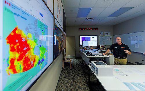 MIKE DEAL / FREE PRESS
Stephen Tulle, national duty officer for CIFFC, in the operations centre during a tour of the Canadian Interagency Forest Fire Centre (CIFFC) which is a not-for-profit corporation owned and operated by the federal, provincial and territorial wildland fire management agencies to coordinate resource sharing, mutual aid, and information sharing.
CIFFC is also a facilitator of wildland fire cooperation and coordination nationally and internationally in long-range fire management planning, program delivery and human resource strategies.
Reporter: Nicole Buffie
250717 - Thursday, July 17, 2025.