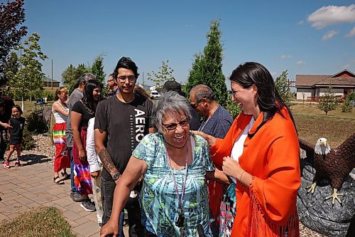 25072025
Community members congratulate Birdtail Sioux Dakota Nation Chief Tréchelle Bunn and council members after the swearing in ceremony for the new chief and council at Birdtail on a hot Friday afternoon. Bunn is the first woman to be elected chief at Birdtail and is also the youngest chief elected. 
(Tim Smith/The Brandon Sun)