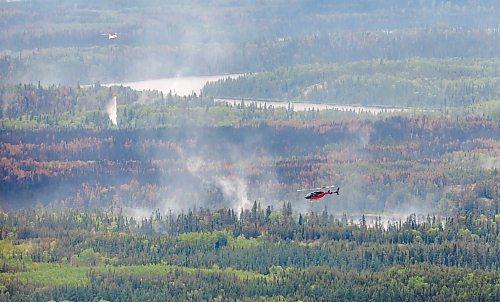 Premier Wab Kinew takes a tour of the wildfires in northern Manitoba, making stops in Flin Flon and Thompson. Erna Buffie asks, given climate-driven extreme weather, why are we casting aside environmental concerns as we seek economic resilience to the U.S.? (Mike Deal/Winnipeg Free Press files)