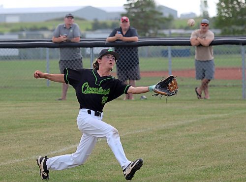 Brandon Cloverleafs left fielder Liam Oliver chases down a foul ball during the U15 AA baseball Tier 2 provincial final against the Kenora Selects at Simplot Millennium Park on Sunday. (Thomas Friesen/The Brandon Sun)