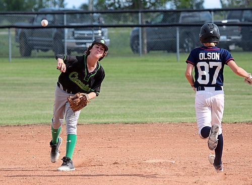 Brandon Cloverleafs Noah Ashmead tries to turn a double play during the U15 AA baseball Tier 2 provincial final against the Kenora Selects at Simplot Millennium Park on Sunday. (Thomas Friesen/The Brandon Sun)