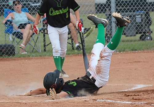 It wasn't the prettiest head-first slide, but Noah Hofer beat the throw home for the second run of the U15 AA baseball Tier 2 provincial final as the Brandon Cloverleafs defeated the Kenora Selects 2-0 at Simplot Millennium Park on Sunday. (Thomas Friesen/The Brandon Sun)