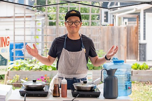 BROOK JONES/FREE PRESS
Aaron Li, who moved to Winnipeg with his family in 2022, markets Chinese dumplings based on family recipes and sells his dumplins at the Wolseley Farmers Market at Saint Margaret's Anglican Church in Winnipeg, Man. Li has a variety of dumplings such as pork with cabbage and chive, tofu with kimchi and beef with carrots and onion. Li, 37, is pictured at his Super Flying Dumpling booth during the Wolseley Farmers Market Tuesday, July 29, 2025.