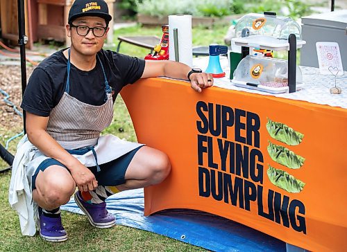 BROOK JONES/FREE PRESS
Aaron Li, who moved to Winnipeg with his family in 2022, markets Chinese dumplings based on family recipes and sells his dumplins at the Wolseley Farmers Market at Saint Margaret's Anglican Church in Winnipeg, Man. Li has a variety of dumplings such as pork with cabbage and chive, tofu with kimchi and beef with carrots and onion. Li, 37, is pictured at his Super Flying Dumpling booth during the Wolseley Farmers Market Tuesday, July 29, 2025.