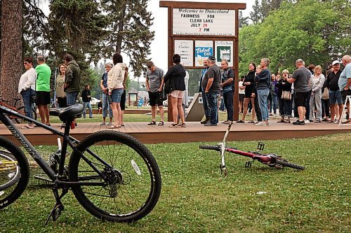 29072025
A large crowd cues to enter Danceland in Wasagaming for the Fairness For Clear Lake town hall regarding the Clear Lake boat ban and Zebra Mussel presence in the lake on Tuesday evening. Hundreds of community members and stakeholders filled Danceland to listen to speakers including experts, politicians and Parks Canada staff, as well as to ask questions. 
(Tim Smith/The Brandon Sun)