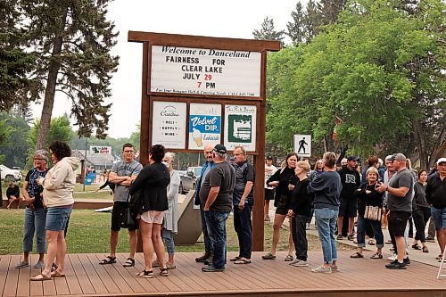 29072025
A large crowd cues to enter Danceland in Wasagaming for the Fairness For Clear Lake town hall regarding the Clear Lake boat ban and Zebra Mussel presence in the lake on Tuesday evening. Hundreds of community members and stakeholders filled Danceland to listen to speakers including experts, politicians and Parks Canada staff, as well as to ask questions. 
(Tim Smith/The Brandon Sun)