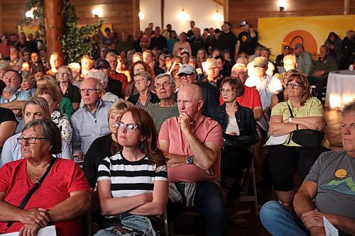 29072025
A large crowd fills Danceland in Wasagaming for the Fairness For Clear Lake town hall regarding the Clear Lake boat ban and Zebra Mussel presence in the lake on Tuesday evening. Hundreds of community members and stakeholders filled Danceland to listen to speakers including experts, politicians and Parks Canada staff, as well as to ask questions. 
(Tim Smith/The Brandon Sun)