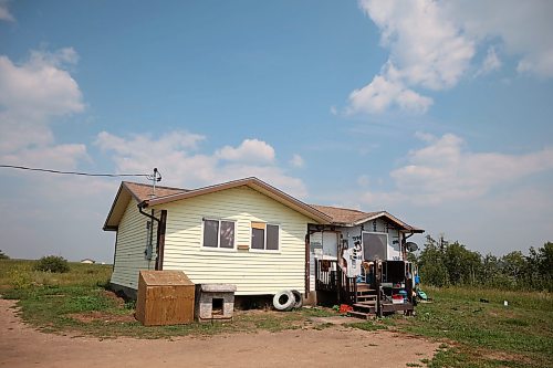 30072025
A home on Keeseekoowenin First Nation where 33-year-old Vanessa Bone was murdered and a 26-year-old man injured in a targeted shooting early Monday. Family and friends are tending to a sacred fire for four days at the home according to tradition.
(Tim Smith/The Brandon Sun)