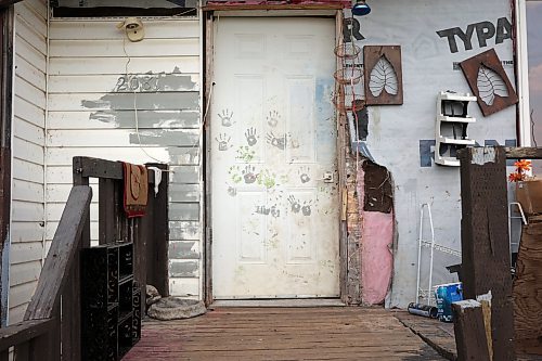 30072025
A home on Keeseekoowenin First Nation where 33-year-old Vanessa Bone was murdered and a 26-year-old man injured in a targeted shooting early Monday. Family and friends are tending to a sacred fire for four days at the home according to tradition. 
(Tim Smith/The Brandon Sun)