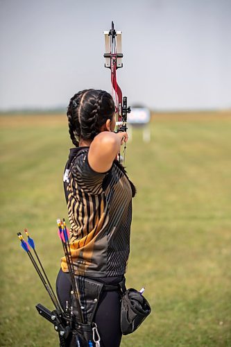 BROOK JONES/FREE PRESS
Khushreet Sandhu is focused on the target while practicing at the Archery Manitoba Sanford Range in the RM of Macdonald, Man., Wednesday, July 30, 2025. The 13-year-old will be competing in U15 Compound, which is the youngest competitive bowstyle in archery, at the 2025 World Archery Youth Championships in Winnipeg from Aug. 17 to 24.