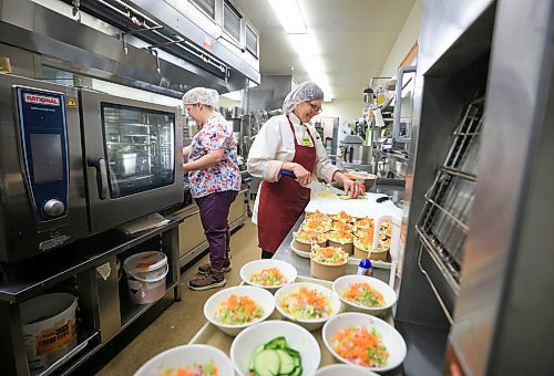 Ruth Bonneville / Free Press
Faith - Gary Ledoux
Photo of Bethania Personal Care Home kitchen staff, Anna Sawatsky (right) and Jaime Groll preparing lunch for their care home residents Friday.
Story on how Winnipeg’s 37 personal care homes provide food that is mass-produced in an off-site commercial kitchen, frozen and then re-heated and distributed to residents. Bethania home has their own on-site kitchen and culinary staff.
See John Longhurst story
Aug 1st, 2025