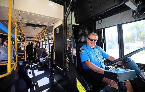 Ruth Bonneville / Free Press
Local - first 60-foot battery-electric bus
Bus driver, Allen Fifer, who worked as a transit driver for 45 years, is all smiles as he prepares to take Mayor Scott Gillingham and others for a ride-along on Winnipeg’s 1st 60-foot battery-electric bus to the stadium at the end of the press conference Thursday.
Winnipeg Mayor Scott Gillingham and Winnipeg Transit hold press conference and ride-along to celebrate being the first Canadian city to put 60-foot battery-electric buses into service at Winnipeg Transit’s Fort Rouge Garage Thursday.
Story by JOYANNE
Aug 7th, 2025