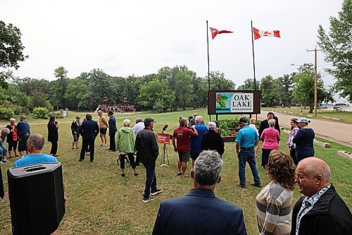 Dozens gather at Oak Lake Provincial Park in July, when the province announced it would spend $95,000 to install an aeration system in Oak Lake. The system is tentatively planned to be installed in September on the beach in the background. (Connor McDowell/The Brandon Sun files)