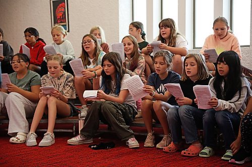 12082025
Ten and eleven-year-old kids in the intermediate choir class at Mecca Productions summer camp practice a song with instructor Clint McLachlan at the Western Manitoba Centennial Auditorium on Tuesday. On Friday afternoon, the over 170 students in the camp, between the ages of 6-18, will perform for family at the auditorium. Tickets for the 2:30PM performance can be purchased through the WMCA.
(Tim Smith/The Brandon Sun)