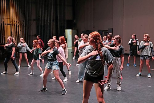 12082025
Twelve and thirteen-year-old kids in the senior dance class at Mecca Productions summer camp practice choreography for the song Where I Want To Be at the Western Manitoba Centennial Auditorium on Tuesday. On Friday afternoon, the over 170 students in the camp, between the ages of 6-18, will perform for family at the auditorium. Tickets for the 2:30PM performance can be purchased through the WMCA.
(Tim Smith/The Brandon Sun)