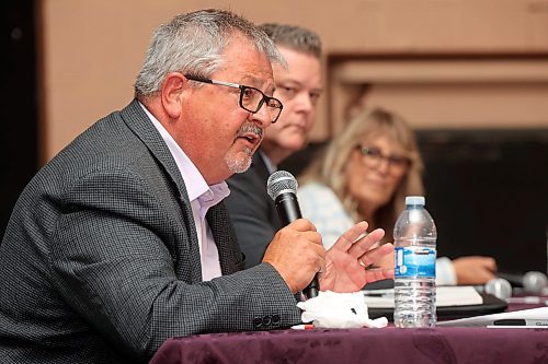 13082025
Ray Berthelette of the NDP speaks as Colleen Robbins of the PC Party of Manitoba and Stephen Reid of the Manitoba Liberal Party listen during the Souris & Glenwood Chamber of Commerce byelection debate at the Avalon Theatre in Souris on Wednesday evening.
(Tim Smith/The Brandon Sun)