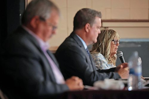 13082025
Colleen Robbins of the PC Party of Manitoba speaks during the Souris &amp; Glenwood Chamber of Commerce byelection debate with Ray Berthelette of the NDP and Stephen Reid of the Manitoba Liberal Party at the Avalon Theatre in Souris on Wednesday evening. 
(Tim Smith/The Brandon Sun)
