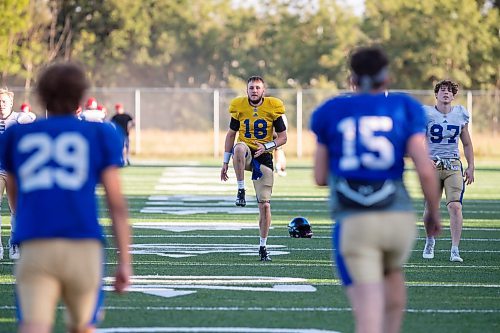 BROOK JONES/FREE PRESS
Winnipeg Rifles quarterback Riley Element (No. 18) is pictured doing an A-skip running drill during warm up at the team's practice at Maple Grove Rugby Park in Winnipeg, Man., Wednesday, Aug. 13, 2025. The Rifles of the Canadian Junior Football League take on the Edmonton Wildcats in Sherwood Park, Alta., Sunday, Aug. 17.