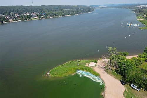 The beach is empty at Minnedosa Lake on the Friday of August long weekend, while algae advisories were issued in the area warning people of potential risks. The stewardship group Friends of Lake Minnedosa is looking for ways to curb algae growth and prepare to address zebra mussels at the beach if the species enters the lake. (Tim Smith/The Brandon Sun files)