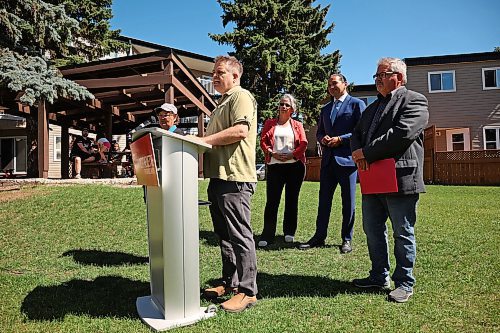 Progressive Conservative party member Ted Dzogan endorses Manitoba NDP candidate Ray Berthelette in the Spruce Woods byelection during a press conference at the Spruce Woods Housing Cooperative in Brandon on Friday. (Photos by Tim Smith/The Brandon Sun)