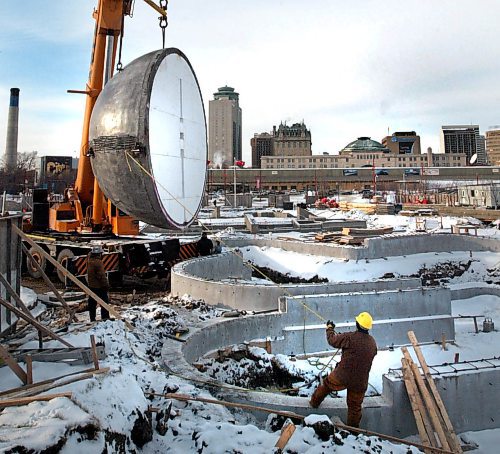 WAYNE GLOWACKI/WINNIPEG FREE PRESS A crane placed a 42,000 pound concrete bowl on it’s side to be the central feature for the new Forks Skateboard Plaza located beside the Scotiabank Stage to be opened next summer. PCL Construction created the one of a kind six inch thick bowl using a massive 3000 pound Styrofoam mold (to be removed). See release. Dec 8 2005