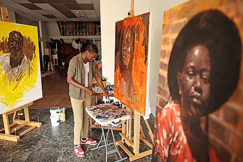 12082025
Artist Opeyemi Olukotun paints in his studio in downtown Brandon in August.
(Tim Smith/The Brandon Sun)