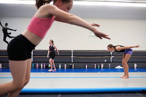 12082025
Students flip through the air during Acro Camp at Steppin’ Time Dance Studio .
(Tim Smith/The Brandon Sun)