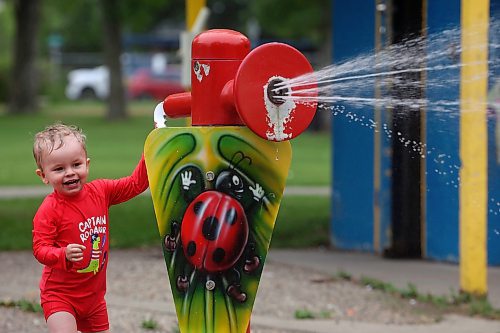 19082025
Two-year-old Sonny Stewart of Neepawa plays at the Stanley Park spray park with family on a warm Tuesday morning.
(Tim Smith/The Brandon Sun)