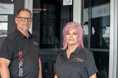 BROOK JONES/FREE PRESS
CearSecure Manufacturing &amp; Distribution is best known for RockGlass, a window security system through impact-resistant windows and doors. The local company is located in CentrePort Canada at 8-3149 Red Fife Rd. in the RM of Rosser, Man. ClearSecure President Colleen Munro (right) and ClearSecure Vice-President Vince Croker are pictured in front of one of their impact-resistant doors and windows at their manufacturing and distribution plant on Tuesday, Aug. 19, 2025.