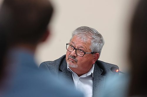 Berthelette listens to a comment from debate emcee Kerry Auriat (off camera). (Matt Goerzen/The Brandon Sun)