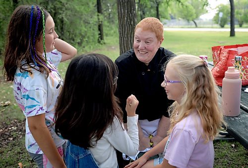 Ruth Bonneville / Free Press
ENT - Lunchbox Chopped
Photo of chef Sharron Park, chatting with the kids.
Photos for a feature on 3 local chefs presenting their lunchbox for 3 children to taste test and judge. The kids and chefs met at a picnic table at Assiniboine Park for the lunchbox taste-testing event.
Names Children taste testing in photos. (First names only)
Blonde child with glasses: Paislee, 8
Dark brown hair,, overalls, glasses Faith, 9
Child with colourful braids: Aria, 10
Names of Chefs + lunches:
1. Sophie Fiola (white apron) - Chicken, bean and corn taquitos with salsa and guacamole, served with a side of carrots and sweet peas, with a horchata-inspired rice pudding for dessert
2. Sharron Park - red lentil buns and WAITING ON THE SOUP DETAILS with seasonal fruit crumble
3. Elisa de Jesus – she was not at the shoot but she made a lunch which was red lentil fritters with quinoa salad and oatmeal raisin cookies
The story is for Weds 27 August.
See AV Kitching for more info and story
Aug 11th, 2025