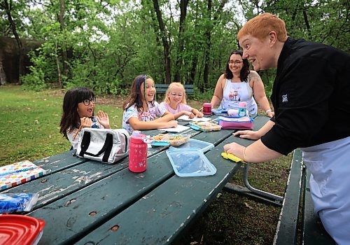 Ruth Bonneville / Free Press
ENT - Lunchbox Chopped
Photo of chefs, Sophie Fiola (left) and Sharron Park presenting their lunches.
Photos for a feature on 3 local chefs presenting their lunchbox for 3 children to taste test and judge. The kids and chefs met at a picnic table at Assiniboine Park for the lunchbox taste-testing event.
Names Children taste testing in photos. (First names only)
Blonde child with glasses: Paislee, 8
Dark brown hair,, overalls, glasses Faith, 9
Child with colourful braids: Aria, 10
Names of Chefs + lunches:
1. Sophie Fiola (white apron) - Chicken, bean and corn taquitos with salsa and guacamole, served with a side of carrots and sweet peas, with a horchata-inspired rice pudding for dessert
2. Sharron Park - red lentil buns and WAITING ON THE SOUP DETAILS with seasonal fruit crumble
3. Elisa de Jesus – she was not at the shoot but she made a lunch which was red lentil fritters with quinoa salad and oatmeal raisin cookies
The story is for Weds 27 August.
See AV Kitching for more info and story
Aug 11th, 2025
