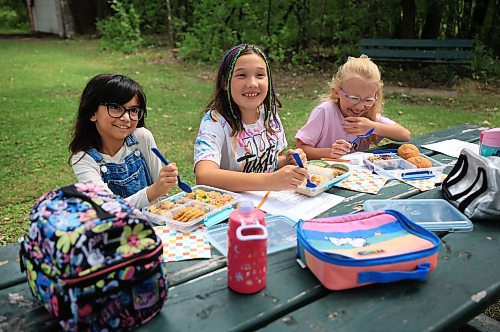 Ruth Bonneville / Free Press
ENT - Lunchbox Chopped
Photo of kids taste testing the lunches.
Dark brown hair,, overalls, glasses Faith, 9
Child with colourful braids: Aria, 10
Blonde child with glasses: Paislee, 8
Photos for a feature on 3 local chefs presenting their lunchbox for 3 children to taste test and judge. The kids and chefs met at a picnic table at Assiniboine Park for the lunchbox taste-testing event.
Names Children taste testing in photos. (First names only)
Blonde child with glasses: Paislee, 8
Dark brown hair,, overalls, glasses Faith, 9
Child with colourful braids: Aria, 10
Names of Chefs + lunches:
1. Sophie Fiola (white apron) - Chicken, bean and corn taquitos with salsa and guacamole, served with a side of carrots and sweet peas, with a horchata-inspired rice pudding for dessert
2. Sharron Park - red lentil buns and WAITING ON THE SOUP DETAILS with seasonal fruit crumble
3. Elisa de Jesus – she was not at the shoot but she made a lunch which was red lentil fritters with quinoa salad and oatmeal raisin cookies
The story is for Weds 27 August.
See AV Kitching for more info and story
Aug 11th, 2025