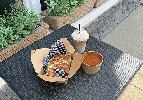 Chipotle chicken and bacon panini, tomato basil soup and a maple sugar iced latte from Farmhouse 50 in Minnedosa on Tuesday. (Skye Anderson/The Brandon Sun)