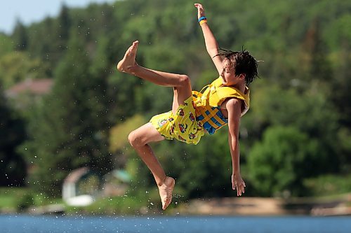 21082025
Jack Kirk is catapulted into the air above Minnedosa Lake while playing with family and friends at the Splish Splash Water Park on the lake on Thursday.
(Tim Smith/The Brandon Sun)
