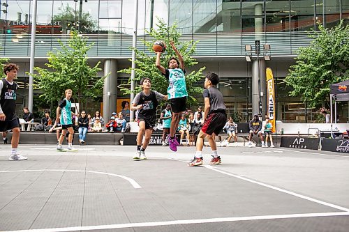 BROOK JONES/FREE PRESS
The Canadian Elite Basketball League is hosting a three-day fan-focused street festival as part of the 2025 Championship Weekend at True North Square and on Graham Avenue between Edmonton St. and Donald St. in Winnipeg, Man. Pictured: Team Westside player Amir Hashmi (middle) takes a jump shot while Team South players Aikam Litt (left) and Caden Guielo (right) cover him during a game of 3x3 basketball on Friday, Aug. 22, 2025.