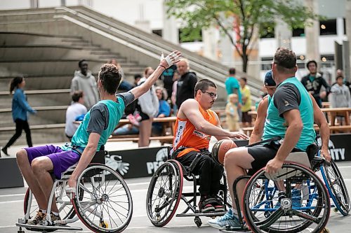 BROOK JONES/FREE PRESS
The Canadian Elite Basketball League is hosting a three-day fan-focused street festival as part of the 2025 Championship Weekend at True North Square and on Graham Avenue between Edmonton St. and Donald St. Pictured: Josh's Jaguars take on SOS in 3x3 wheelchair basketball as part of the street festival at True North Square in Winnipeg, Man., Friday, Aug. 22, 2025.