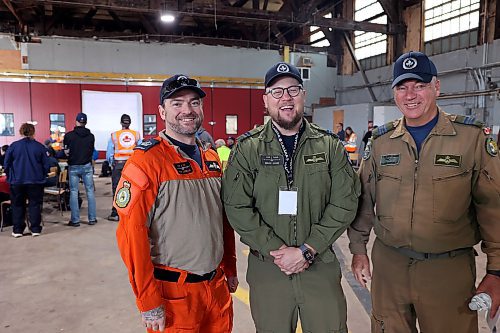 Kevin Cochrane, Mack Cook and Claude Courcelles wait for the day to begin. (Connor McDowell/The Brandon Sun)