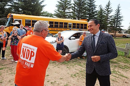 25082025
Spruce Woods NDP candidate Ray Berthelette and NDP leader Wab Kinew greet each other as they meet in Rivers to knock on doors and meet voters along with volunteers on Monday in the final push ahead of today’s Spruce Woods byelection.
(Tim Smith/The Brandon Sun)