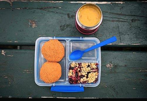 Ruth Bonneville / Free Press
ENT - Lunchbox Chopped
Photo of lunchbox 1 created by Sharron Park - red lentil buns and WAITING ON THE SOUP DETAILS with seasonal fruit crumble.
Photos for a feature on 3 local chefs presenting their lunchbox for 3 children to taste test and judge. The kids and chefs met at a picnic table at Assiniboine Park for the lunchbox taste-testing event.
Names Children taste testing in photos. (First names only)
Blonde child with glasses: Paislee, 8
Dark brown hair,, overalls, glasses Faith, 9
Child with colourful braids: Aria, 10
Names of Chefs + lunches:
1. Sophie Fiola (white apron) - Chicken, bean and corn taquitos with salsa and guacamole, served with a side of carrots and sweet peas, with a horchata-inspired rice pudding for dessert
2. Sharron Park - red lentil buns and WAITING ON THE SOUP DETAILS with seasonal fruit crumble
3. Elisa de Jesus – she was not at the shoot but she made a lunch which was red lentil fritters with quinoa salad and oatmeal raisin cookies
The story is for Weds 27 August.
See AV Kitching for more info and story
Aug 11th, 2025