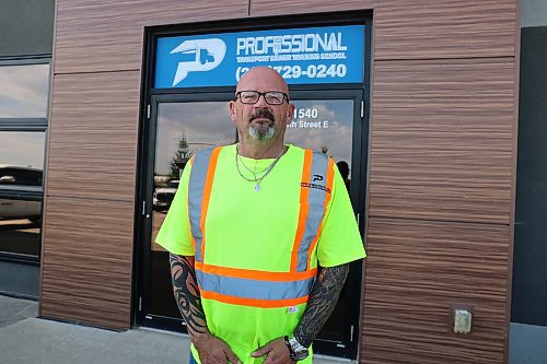 Professional Transport Driver Training School general manager Ryan Kyle stands in front of the school's office on Tuesday. (Abiola Odutola/The Brandon Sun)