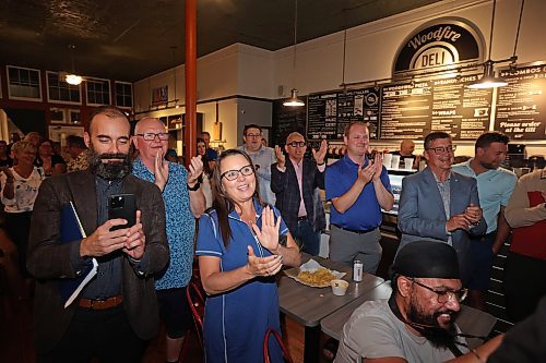 Progressive Conservative supporters applaud Spruce Woods candidate Colleen Robbins at the Woodfire Deli in Souris on Tuesday evening. (Tim Smith/The Brandon Sun)