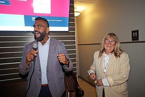 26082025
Progressive Conservative Party of Manitoba candidate Colleen Robbins (R) listens as PC leader Obby Khan speaks at the Woodfire Deli in Souris on Tuesday evening after Robbins was declared the winner in the Spruce Woods byelection. (Tim Smith/The Brandon Sun)