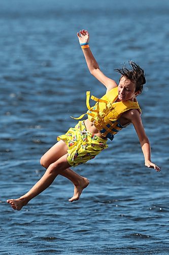 Jack Kirk is catapulted into the air above Minnedosa Lake while playing with family and friends at the Splish Splash Water Park on the lake recently.
(Tim Smith/The Brandon Sun)